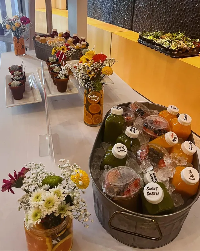 LYNAY juices and fruit cups on ice at an event